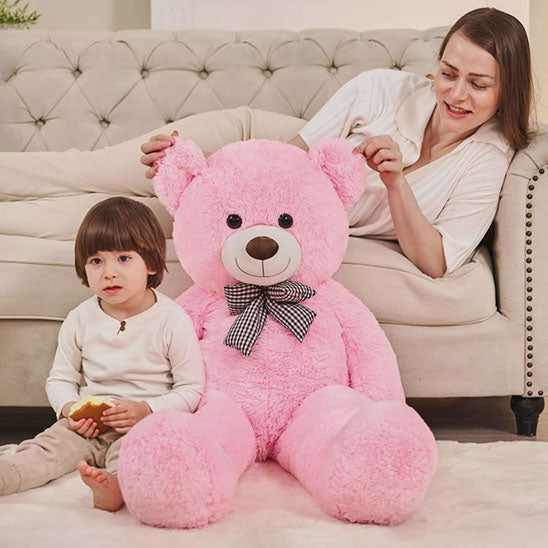 Ours en peluche rose garcon maman canape salon