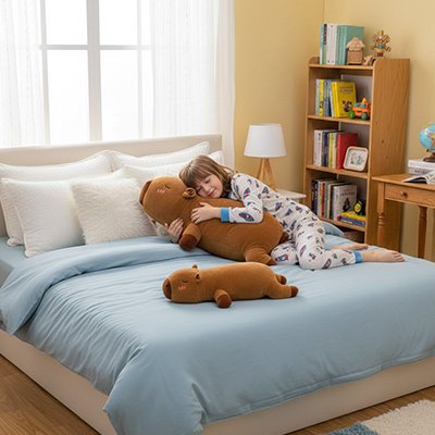 coussin de corps peluche capybara xxl avec enfant