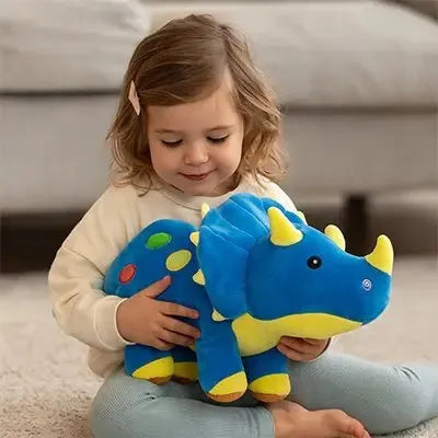 Détails des finitions de la peluche d'éveil dinosaure