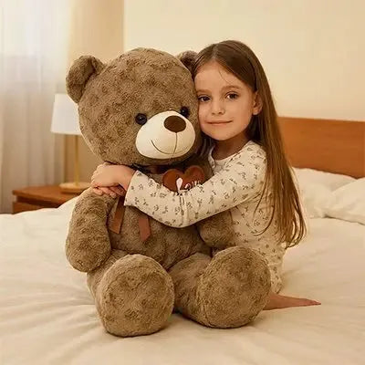 Détails des finitions de la peluche d'éveil ours