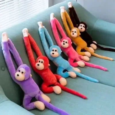 Détails des finitions de la peluche d'éveil singe
