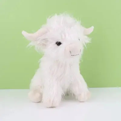 Peluche bovine blanche, parfaite pour moments de tendresse