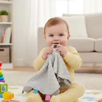 Finitions du doudou d'éveil éléphant