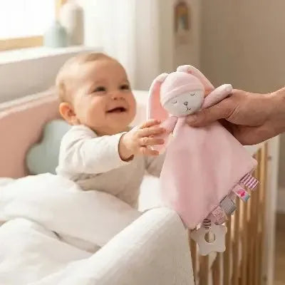 Finitions du doudou d'éveil ours