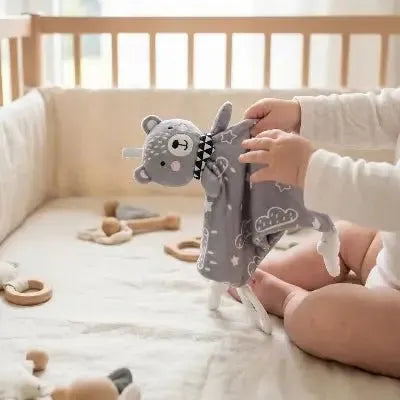 Finitions du doudou d'éveil ours