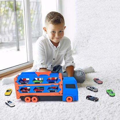 jeune garçon avec ces autos et son camion