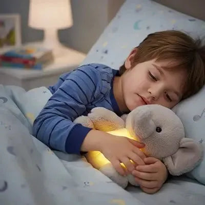Peluche animal douce, Peluche qui respire éléphant avec garçon dans son lit