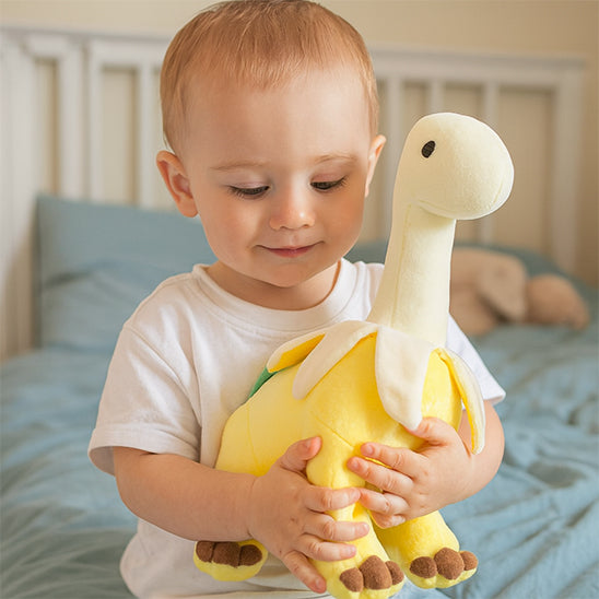 peluche dinosaure jaune bebe lit