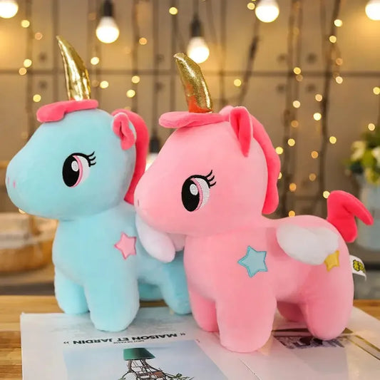peluche licorne rose et bleue avec corne dorée