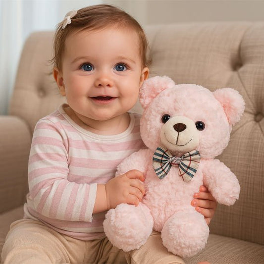 peluche ours rose avec bébé fille