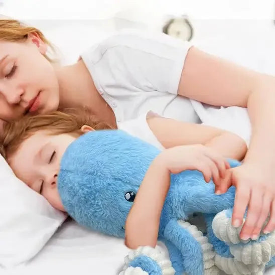 Peluche pieuvre réaliste en situation de jeu
